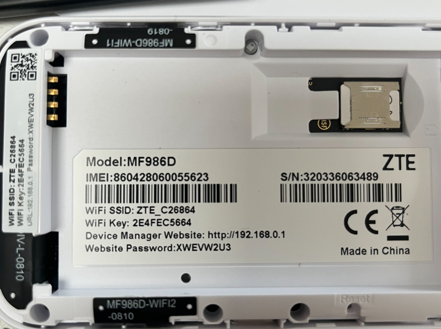 Example ZTE router label showing WiFi SSID, WiFi password, IP address and website password